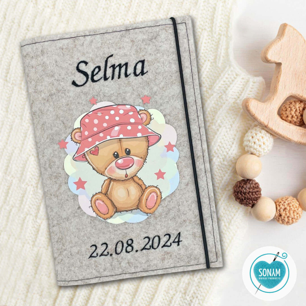 Designbeispiel der U-Heft Hülle beige meliert Teddy mit Sternen für Mädchen